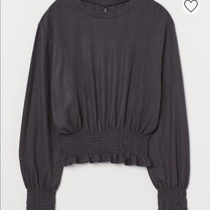 Charcoal gray ruffle trimmed top